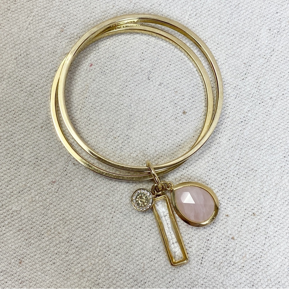 henri bendel Gold Bangle Bracelet with Pink Teardrop and White Charms